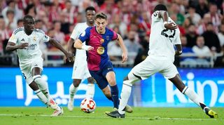 Gavi on the ball for Barcelona against Real Madrid in the Supercopa de España final in January 2025.