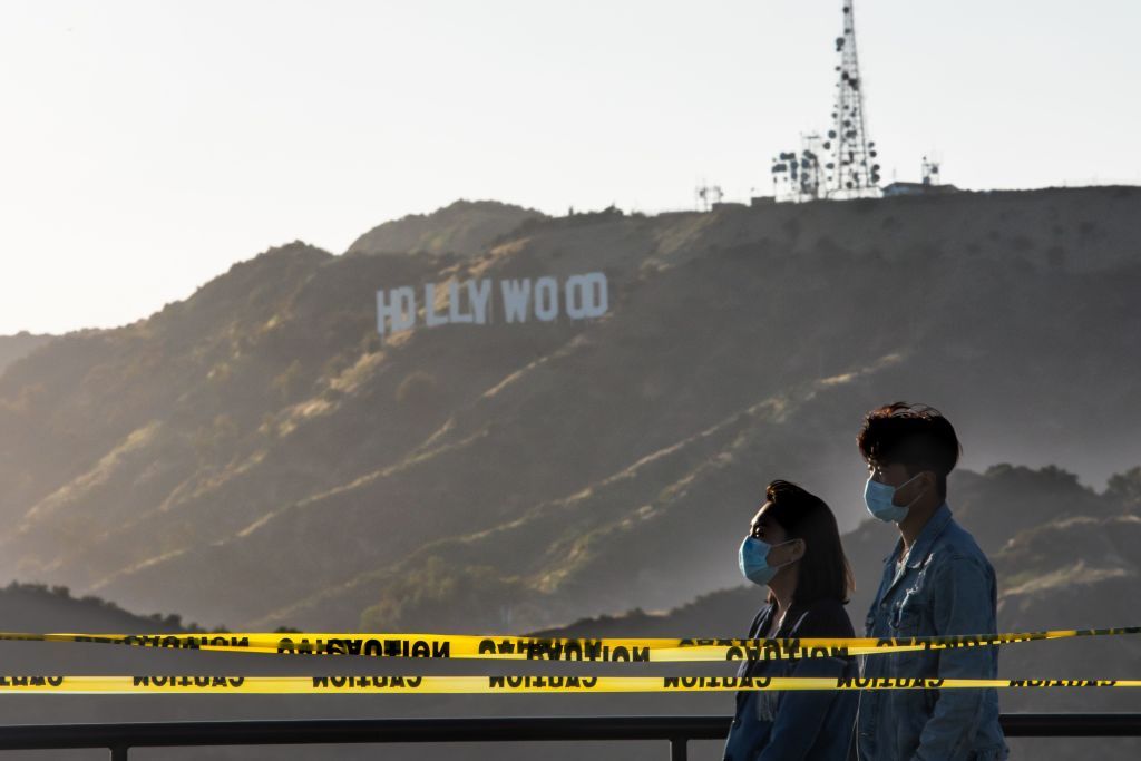 People wear face masks at the Griffith Observatory in Los Angeles.