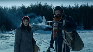 Winona Ryder as Joyce Byers and Brett Gelman as Murray Bauman in Netflix TV show STRANGER THINGS