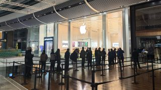Apple Store before opening at Stratford, London on iPhone Duo day with a small, moving queue