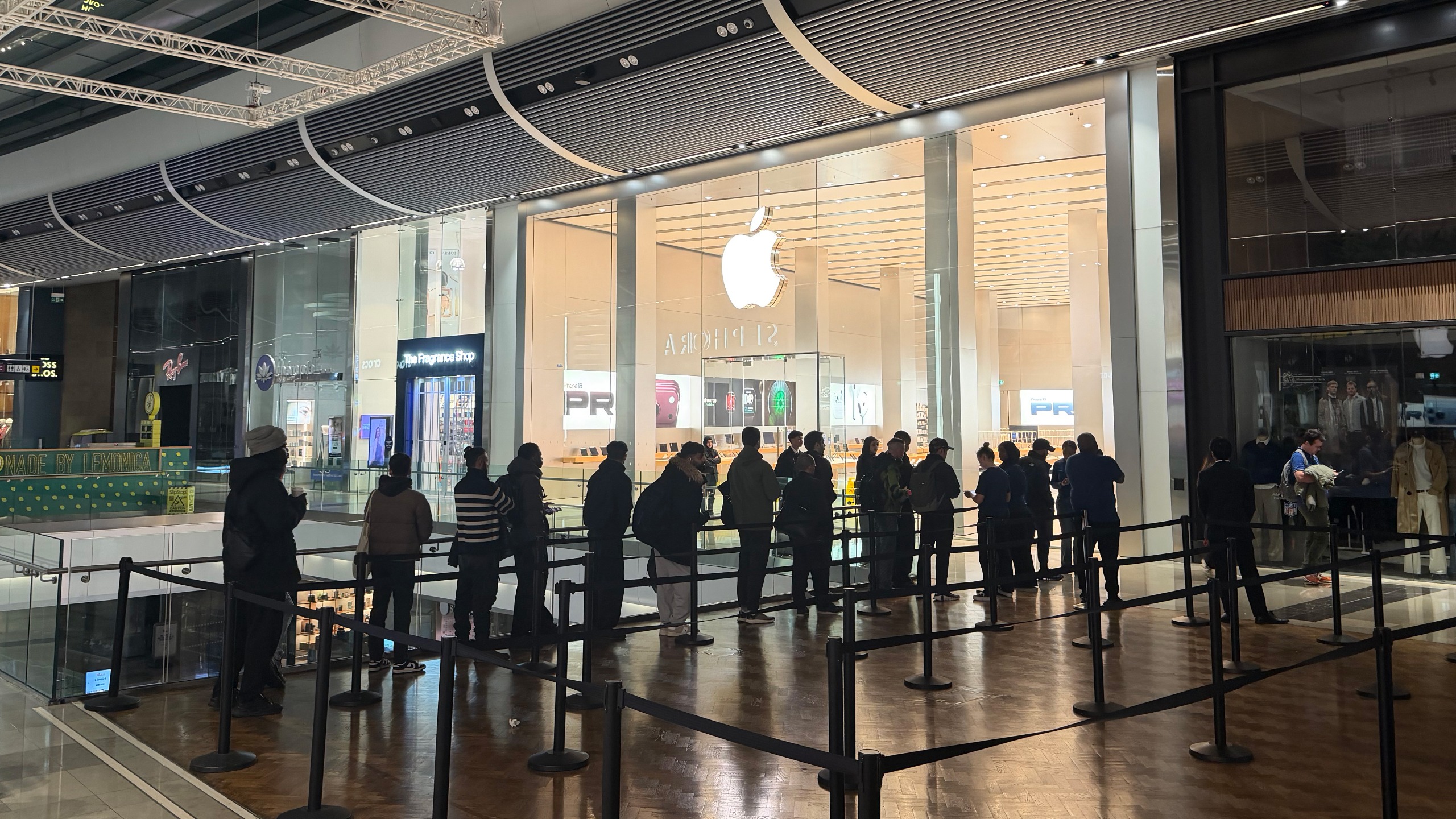Apple Store before opening at Stratford, London on iPhone Duo day with a small, moving queue