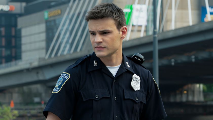 Sean Reagan (Mika Amonsen) looks down on Boston Blue.