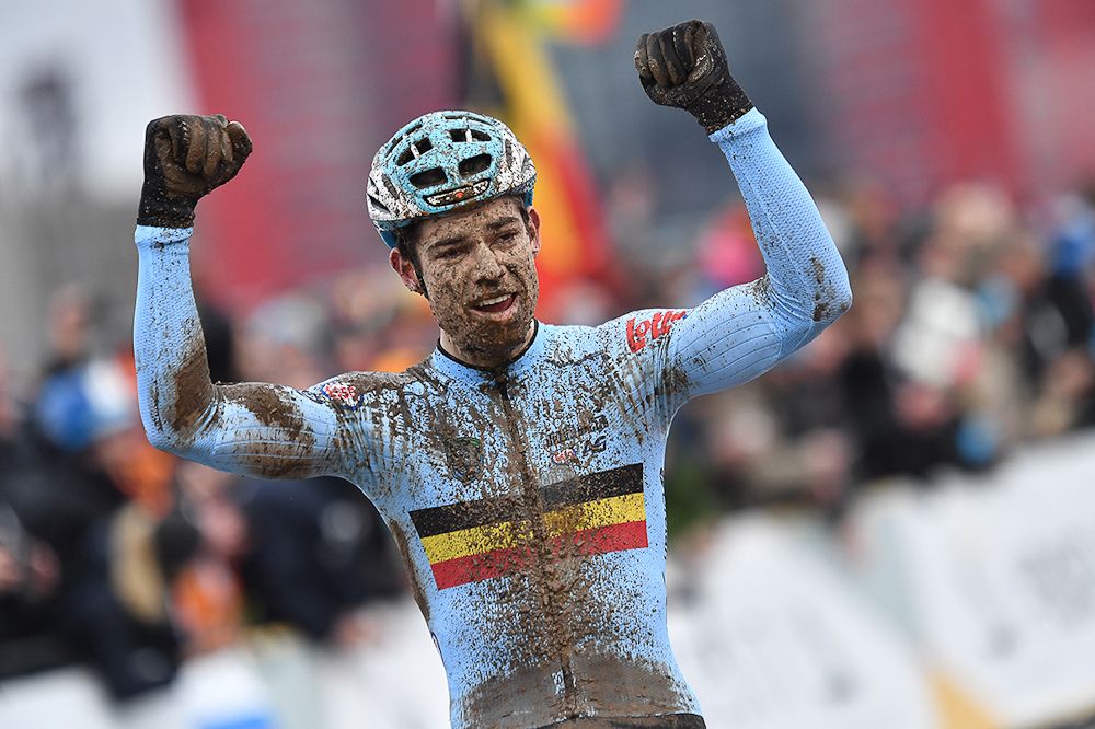 Wout Van Aert celebrates winning his second consecutive rainbow jersey