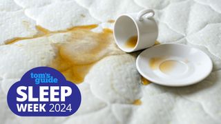 a cup of coffee spilt over the top of a mattress