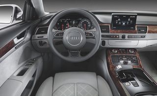 The luxurious interior of the A8 includes craftsmanlike workmanship, and “emotionally charged” interior lighting.