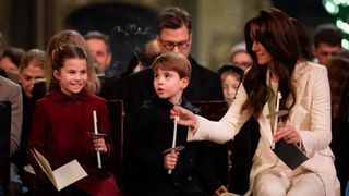 Princess Charlotte, Prince Louis and Catherine, Princess of Wales during the Royal Carols - Together At Christmas service at Westminster Abbey on December 8, 2023 in London, England