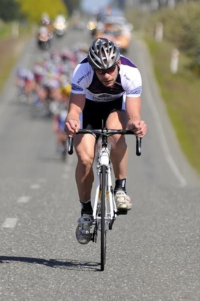 Michael Olheiser of Jackson Plumbing-Plumbing World has escaped the clutch of the peloton.