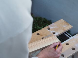marking a skirting board with a pencil