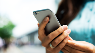 Woman holding phone