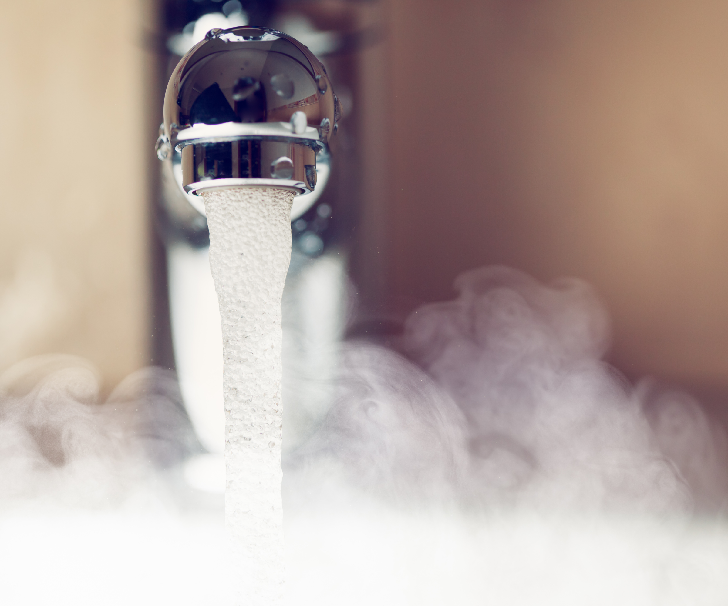 steam coming off a running tap