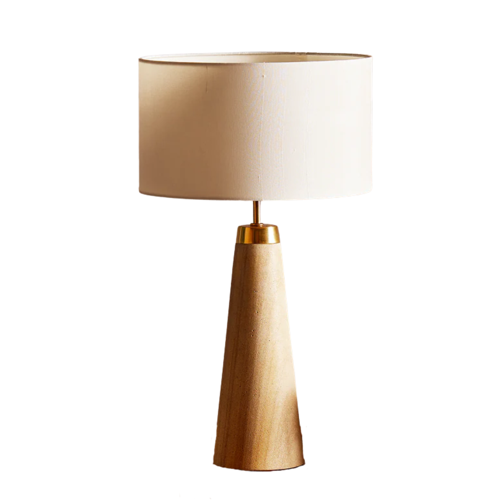 a table lamp with a light tan marble base and a off-white fabric shade