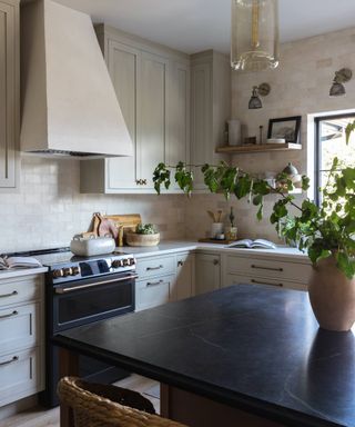 gray kitchen with black range
