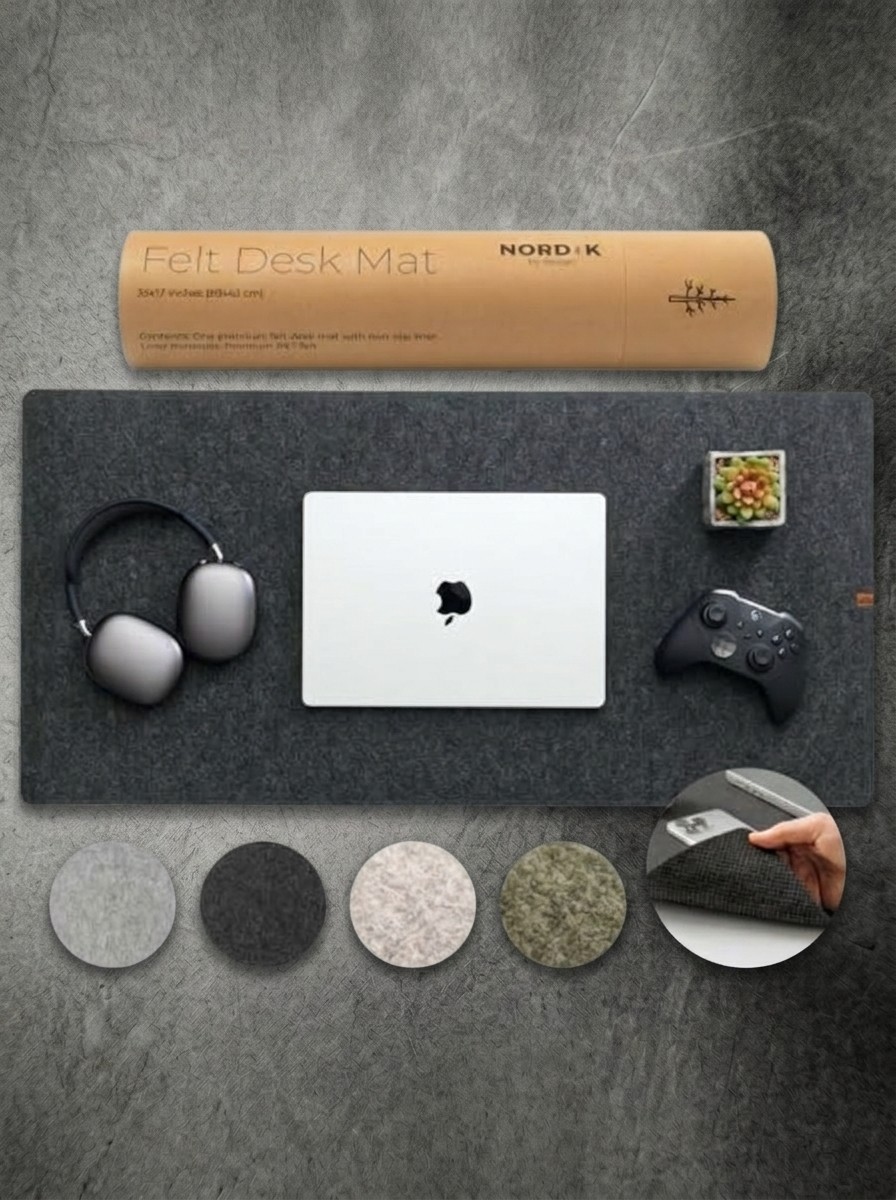 Luxury home office gear on a textured slate grey background
