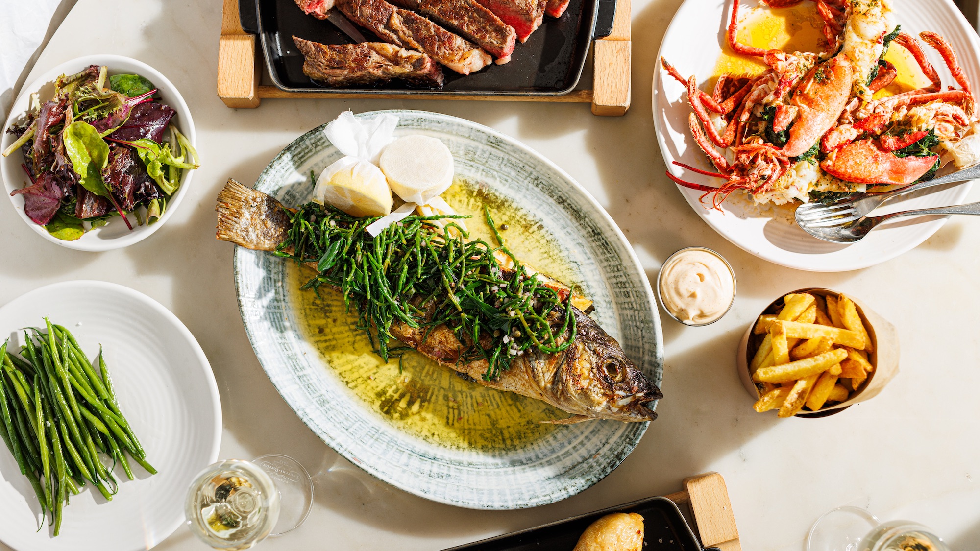 simple great dishes, including whole roast chicken and baked sea bass to share at Sea Containers London