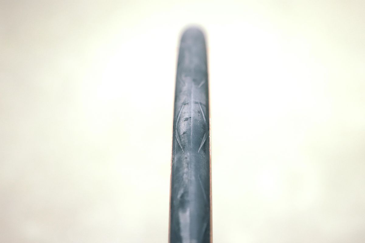 A tan bicycle tyre on a white background