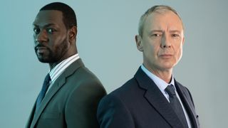 DS Roy Grace (John Simm) and DS Branson (Richie Campbell) back to back