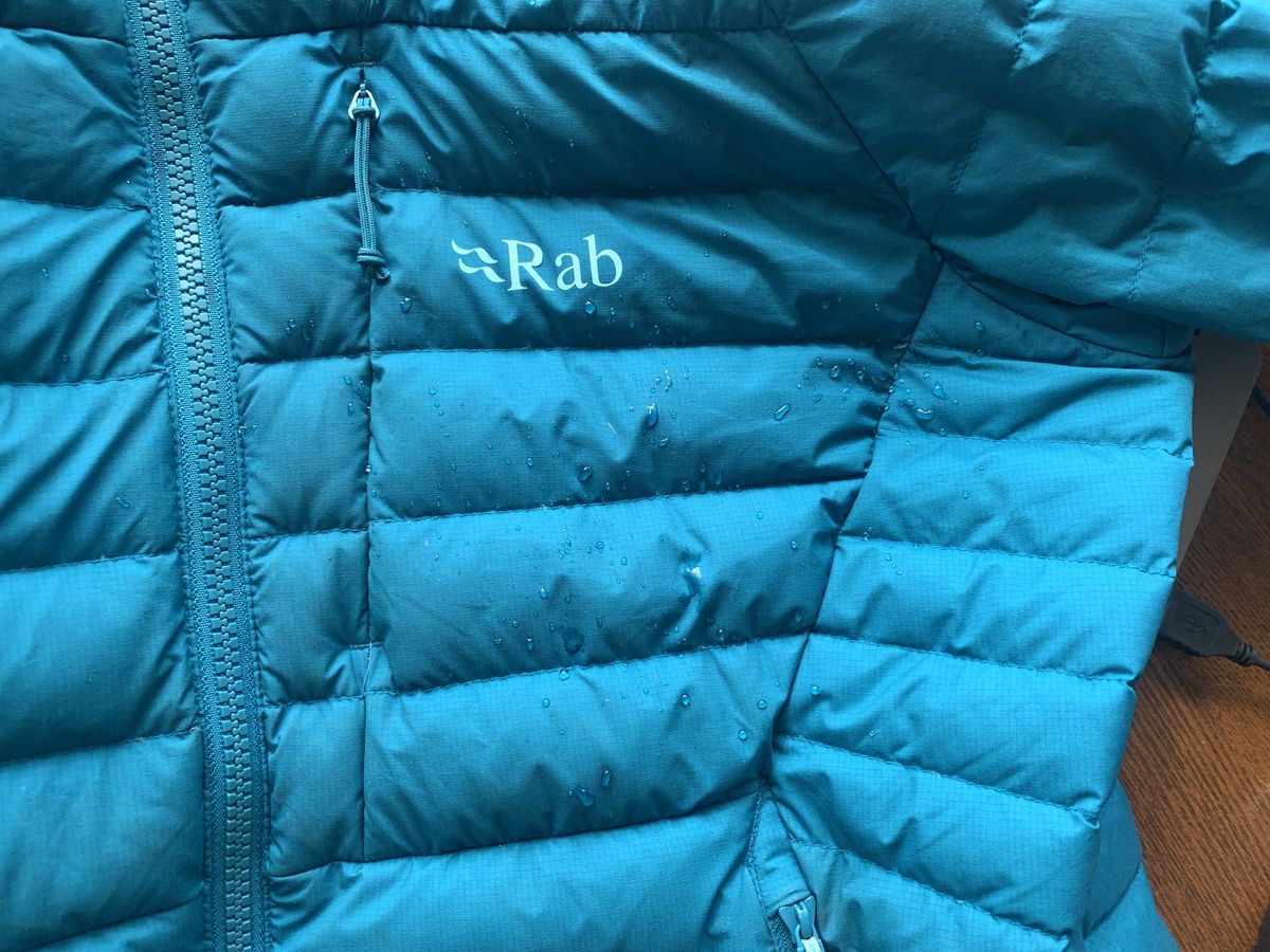 Water beads on Rab Infinity Microlight jacket showing it&#039;s water resistance