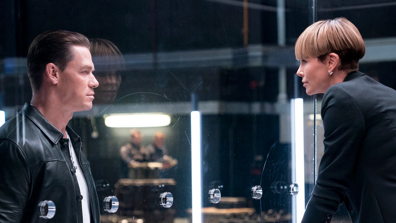 John Cena as Jakob looking in on Charlize Theron as Cipher who is trapped in box in F9