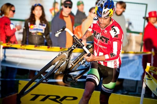 Tim Johnson (Cannondale-Cyclocrossworld.com) goes through barriers with one lap to go.