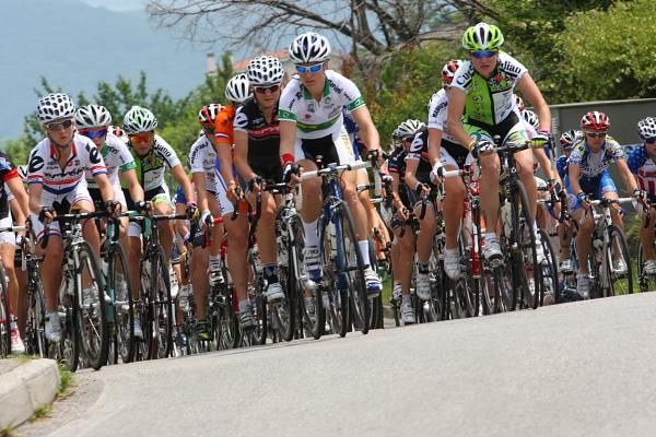 Emma Mackie (Australia) leads over the small climb with Svetlana Bubnenkova (Fenixs - Petrogradets)
