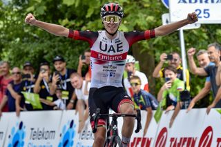 Tadej Pogacar celebrates winning stage 3 at the Tour of Slovenia
