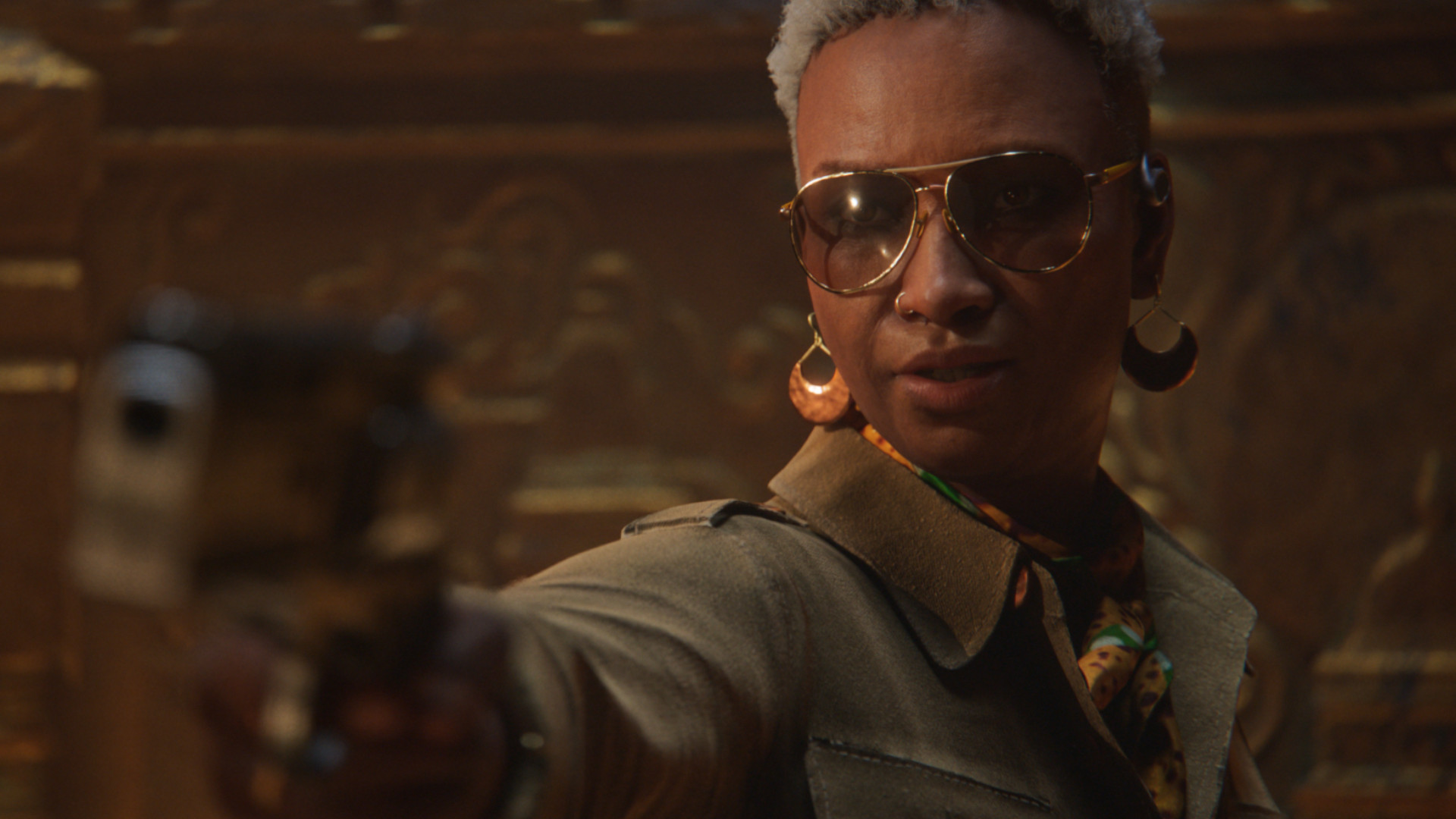 A woman holding a gun while wearing sunglasses during the teaser for Tomb Raider: Catalyst.