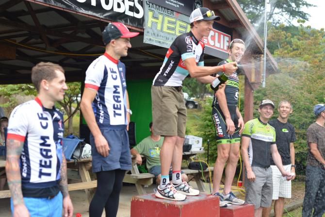 Ben King, center, celebrates taking the top spot on the men&rsquo;s podium at the 2013 Shenandoah Mountain 100. Pictured left to right are: Rob Spreng (Team CF), 5th place; Christian Tanguy (Team CF), 3rd place; Ben King (Radio Shack-Nissan), 1st place; Jeremiah Bishop (SHO-Air-Cannondale), 2nd place; Keck Baker (Cannondale/Champion System/Carytown Bicycle Co), 4th place; and Kevin Carter (Gripped Racing), 6th place.