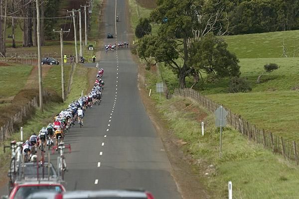 A group tries to sneak clear of the peloton on the second lap of the twelve lap sixth stage.