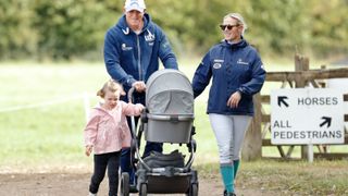 Mike Tindall and Zara Tindall with their daughters Mia Tindall and Lena Tindall (in her pram) attend day 3 of the Whatley Manor Horse Trials at Gatcombe Park on September 9, 2018 in Stroud, England.