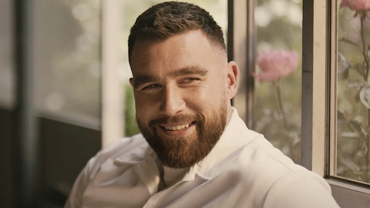 Travis Kelce smiling in Grotesquerie