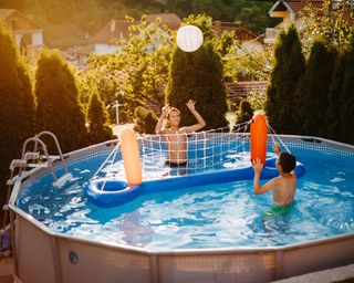 children playing in above ground pool