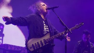 Robert Smith of The Cure performs at OVO Arena Wembley on December 12, 2022 in London, England.