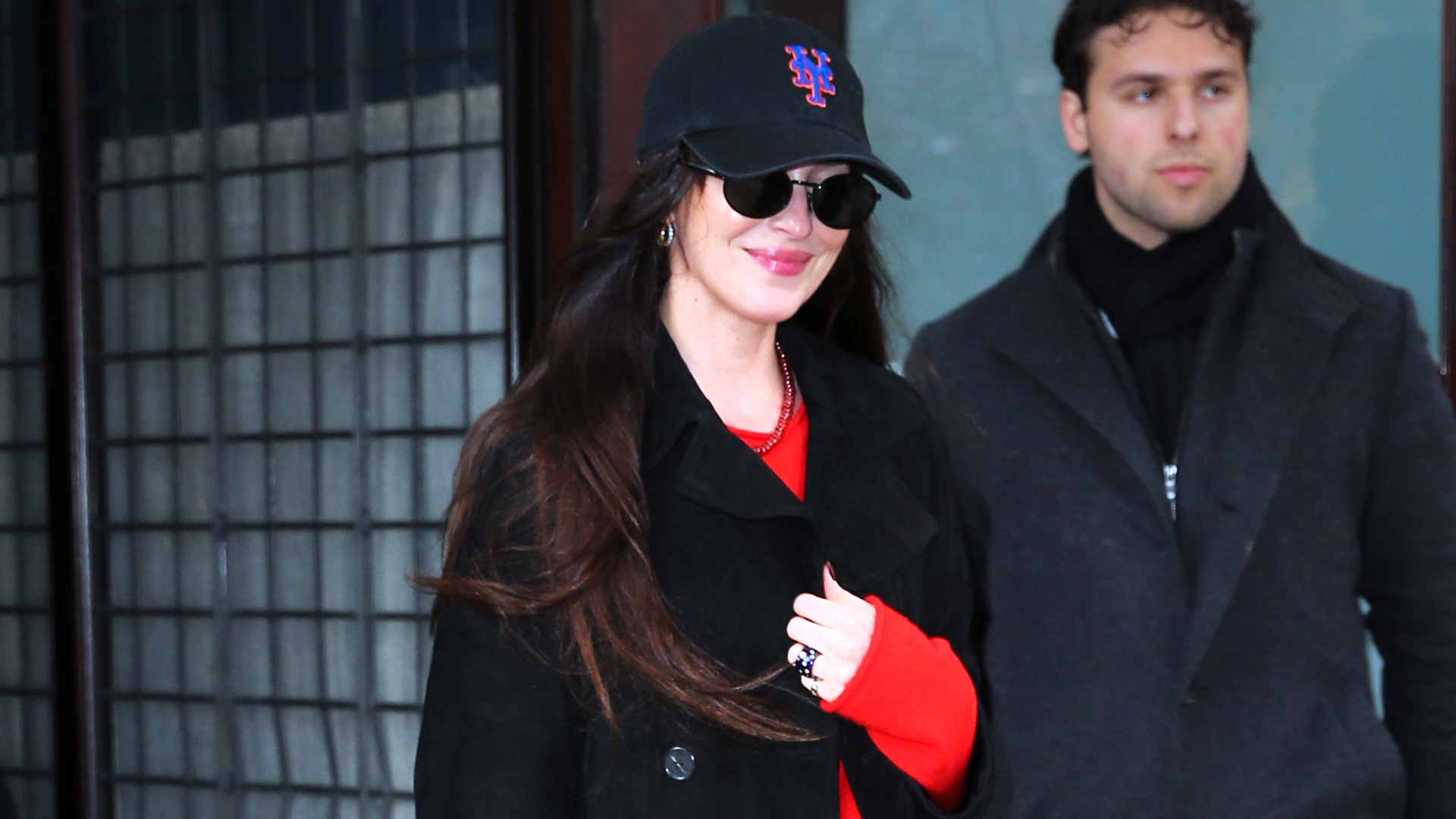 Dakota Johnson's Straight-Leg Jeans and Leopard-Print Prada Bag Pull Focus From New York Fashion Week