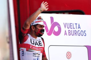 ARANDA DE DUERO SPAIN AUGUST 06 Juan Sebastin Molano Benavides of Colombia and UAE Team Emirates celebrates at podium as stage winner during the 43rd Vuelta a Burgos 2021 Stage 4 a 149km stage from Roa to Aranda de Duero VueltaBurgos BurgosCycling CapitalMundialdelCiclismo on August 06 2021 in Aranda de Duero Spain Photo by Gonzalo Arroyo MorenoGetty Images