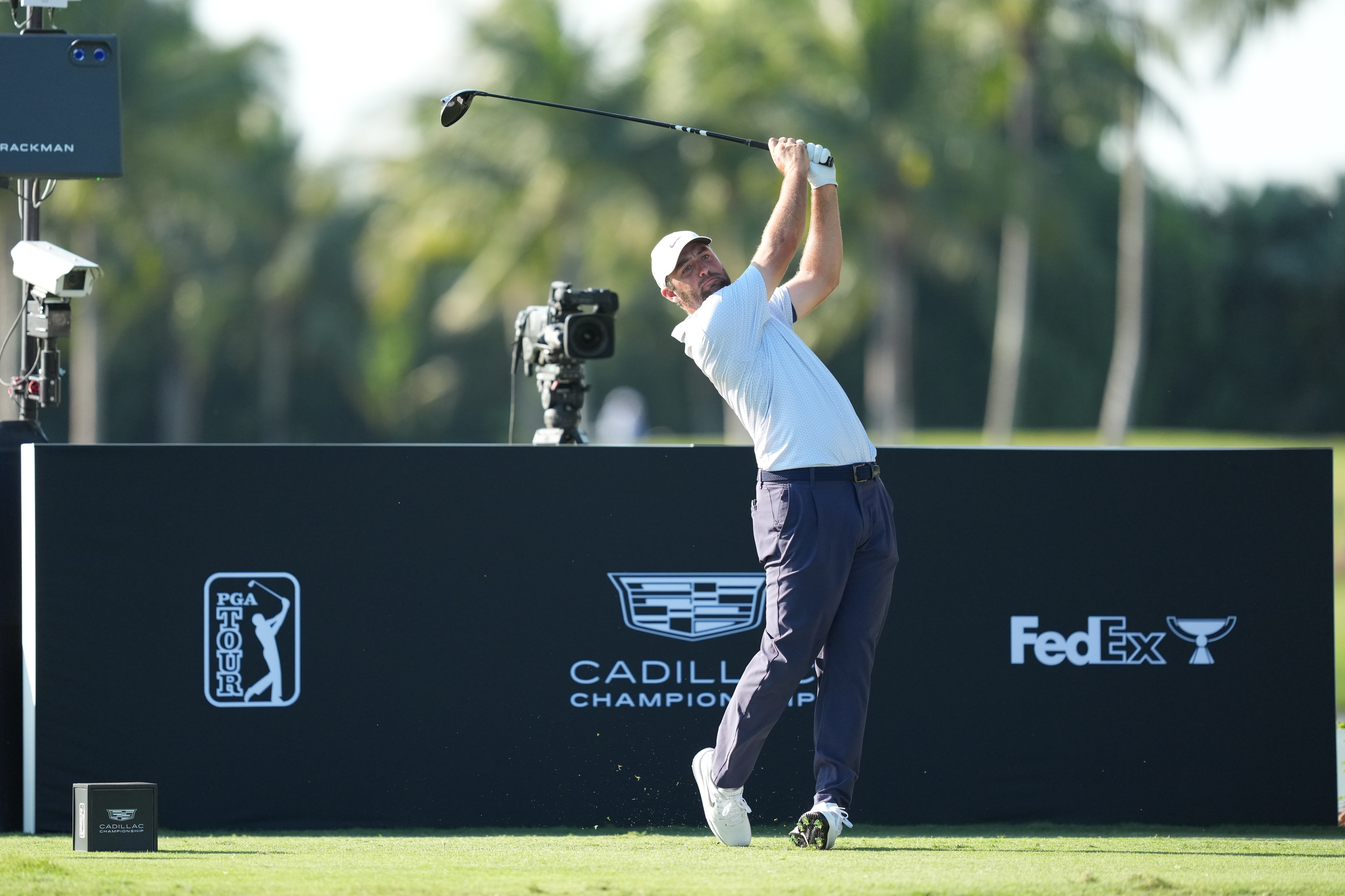 Scottie Scheffler plays a tee shot on the 17th hole during the second round of Cadillac Championship at Trump National Doral - Blue Monster Course