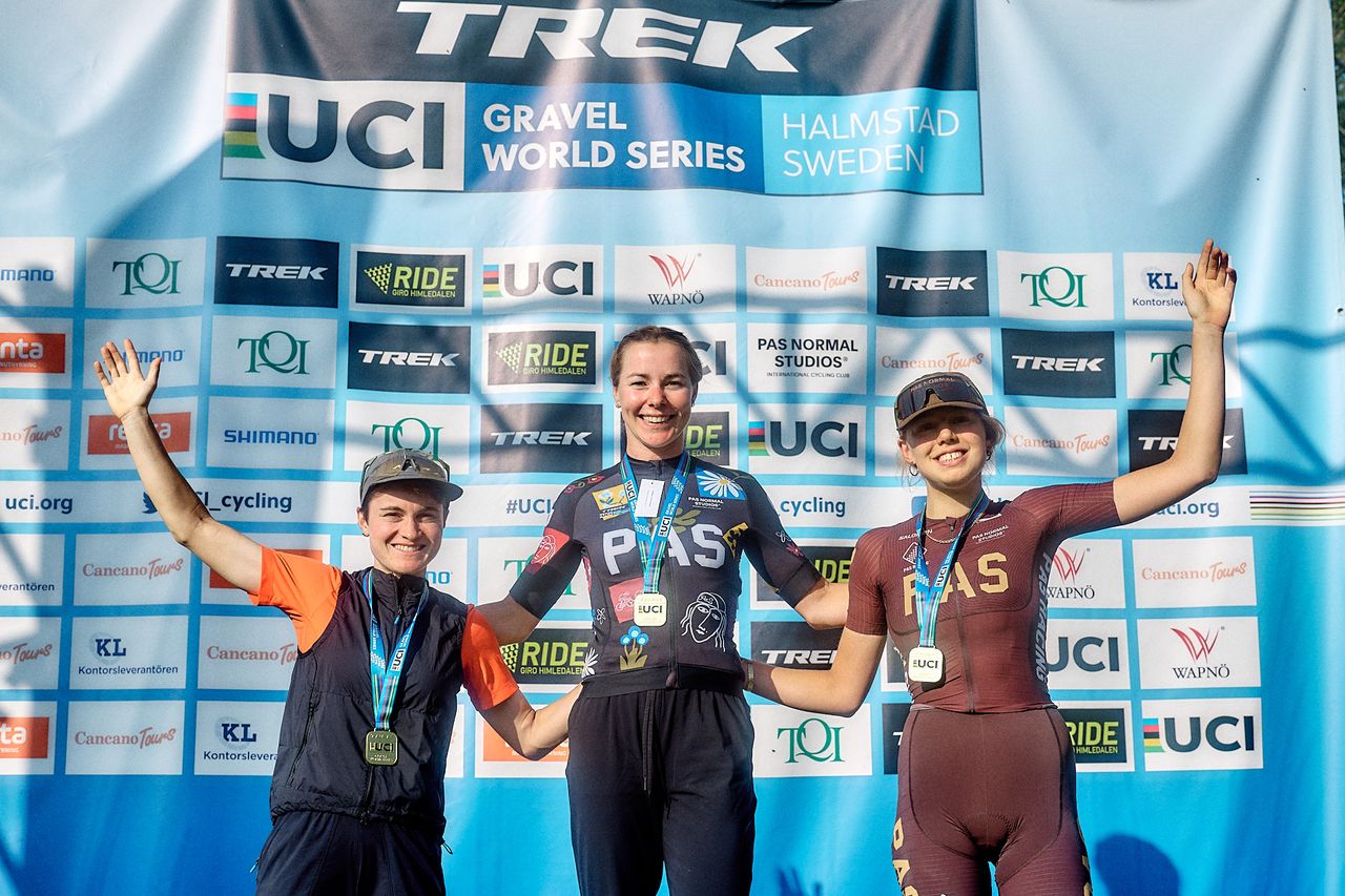 Elite women's podium of Femke Markus in first, Heidi Franz in second and Klara Sofie Skovgard Hansen in third at Gravel Grit 'n Grind, UCI Gravel World Series round in Halmstad, Sweden 2024