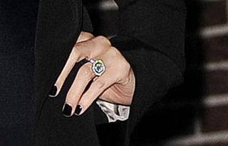 Nicole Richie engaged - flashes her enegagement ring