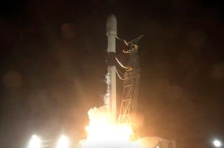 A SpaceX Falcon 9 rocket launches 22 Starlink satellites to orbit from California's Vandenberg Space Force Base on Nov. 20, 2023.