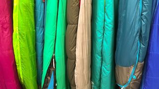 how to store camping gear: sleeping bags hanging up