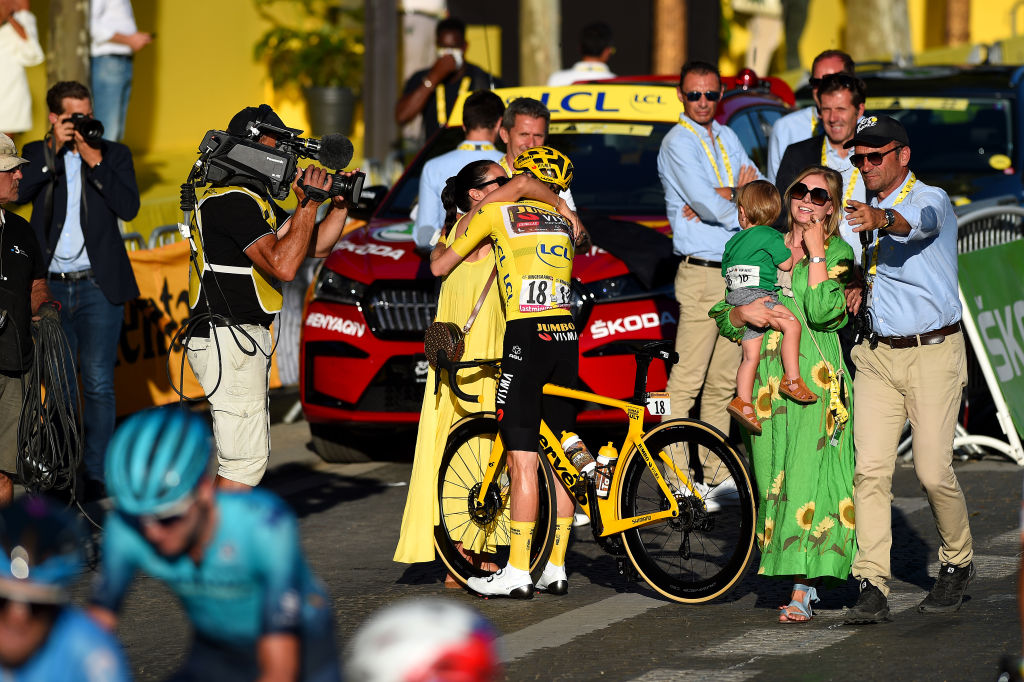 PARIS FRANCE JULY 24 Jonas Vingegaard Rasmussen of Denmark and Team Jumbo Visma Yellow Leader Jersey celebrates with his daughter Frida and wife Trine Hansen as overall race winner after during the 109th Tour de France 2022 Stage 21 a 1156km stage from Paris La Dfense to Paris Champslyses TDF2022 WorldTour on July 24 2022 in Paris France Photo by Dario BelingheriGetty Images