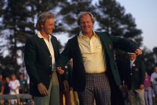 Bernhard Langer hands Jack Nicklaus his green jacket after the 1986 Masters