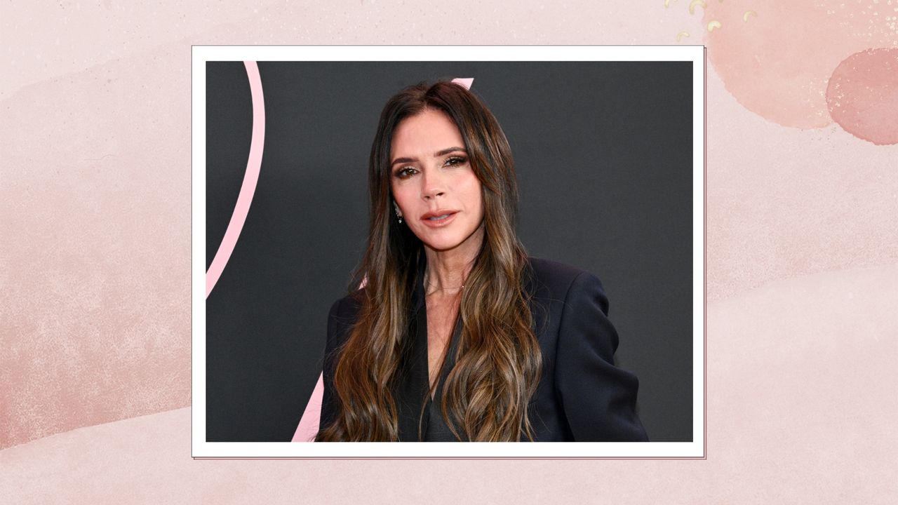 Victoria Beckham is pictured with long wavy hair and wearing a black blazer at the premiere of &quot;Lola&quot; held at the Regency Bruin Theatre on February 3, 2024 in Los Angeles, California/ in a pink gradient template