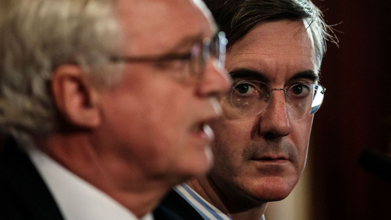 Jacob Rees-Mogg looks on as David Davis unveils Plan A+