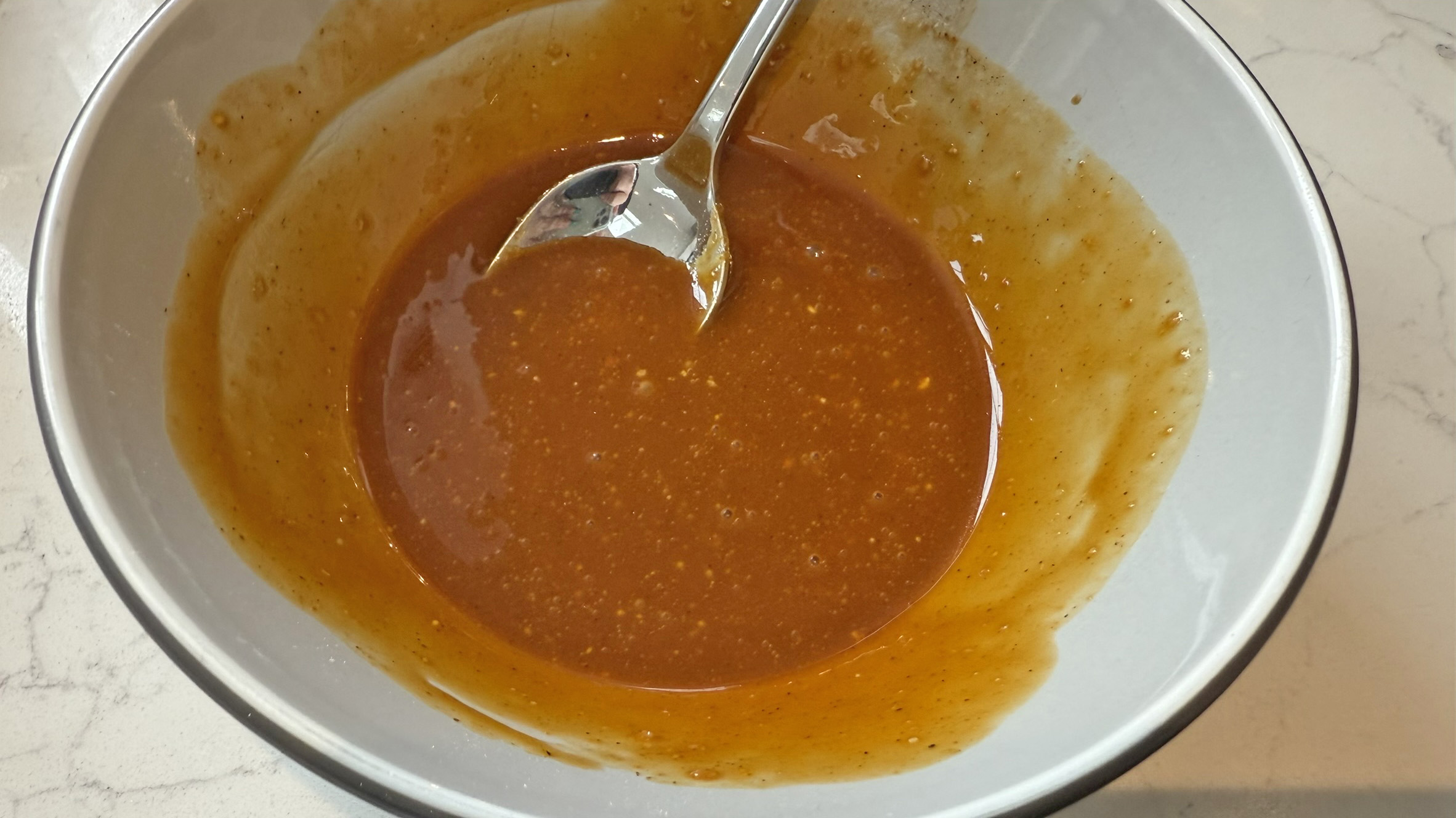 Air fryer sesame chicken sauce in bowl