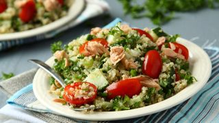 quinoa and salmon salad with tomatoes and broccoli