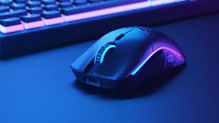 A Glorious gaming mouse on a desk.