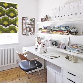 home office room with white wall and wooden flooring