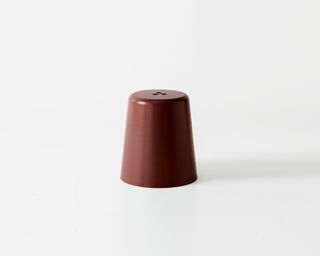 Stool in the shape of a thimble