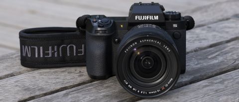The Fujifilm X-H2S camera sitting on a wooden bench