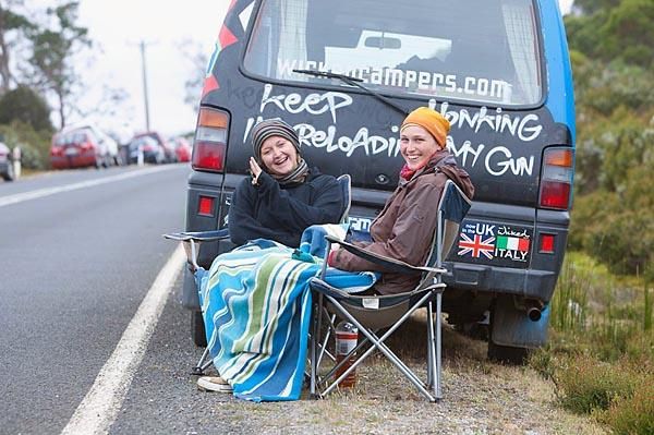 Others were more content to keep warm near the camper.